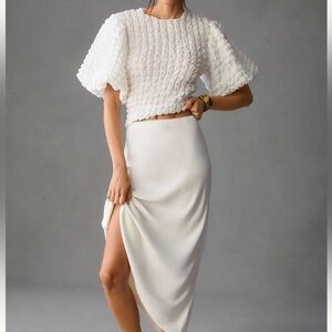 Anthropologie Textured puff-sleeve top